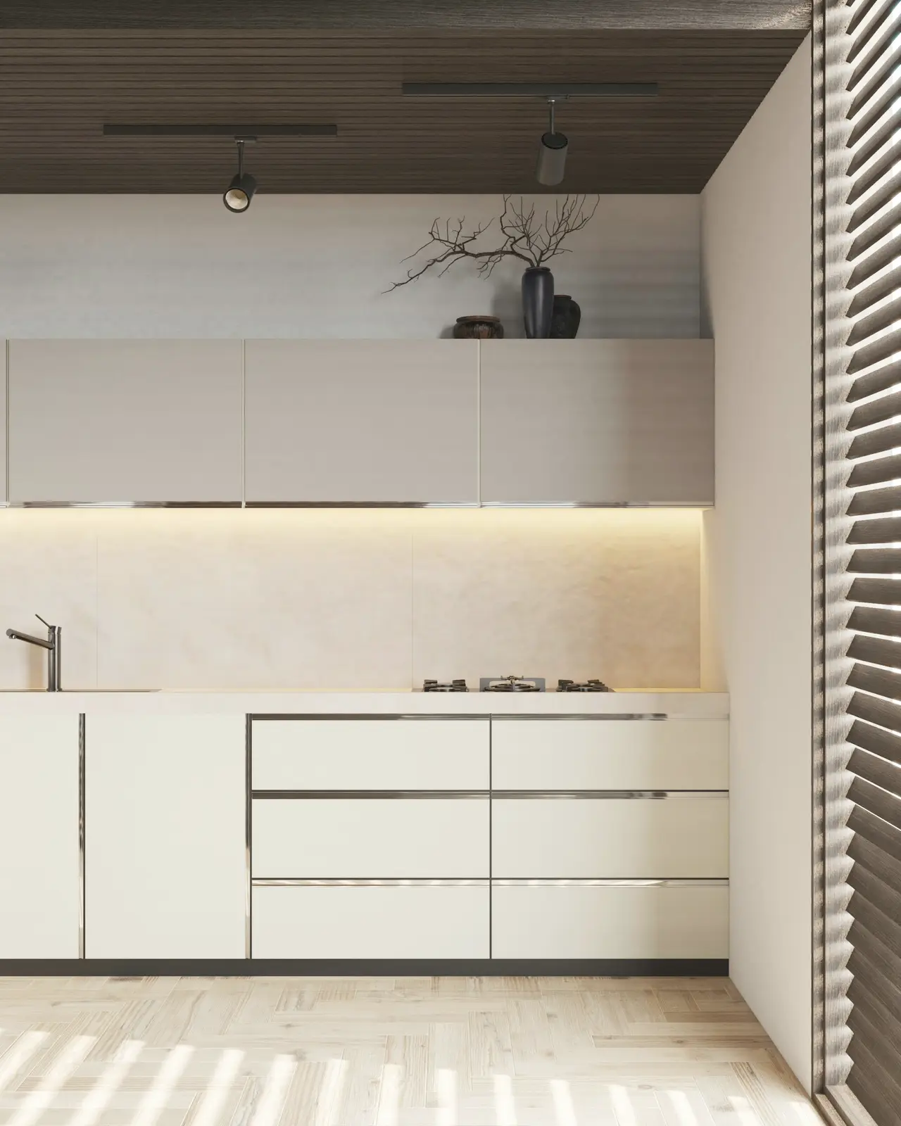 A minimal white kitchen with clear benchtops