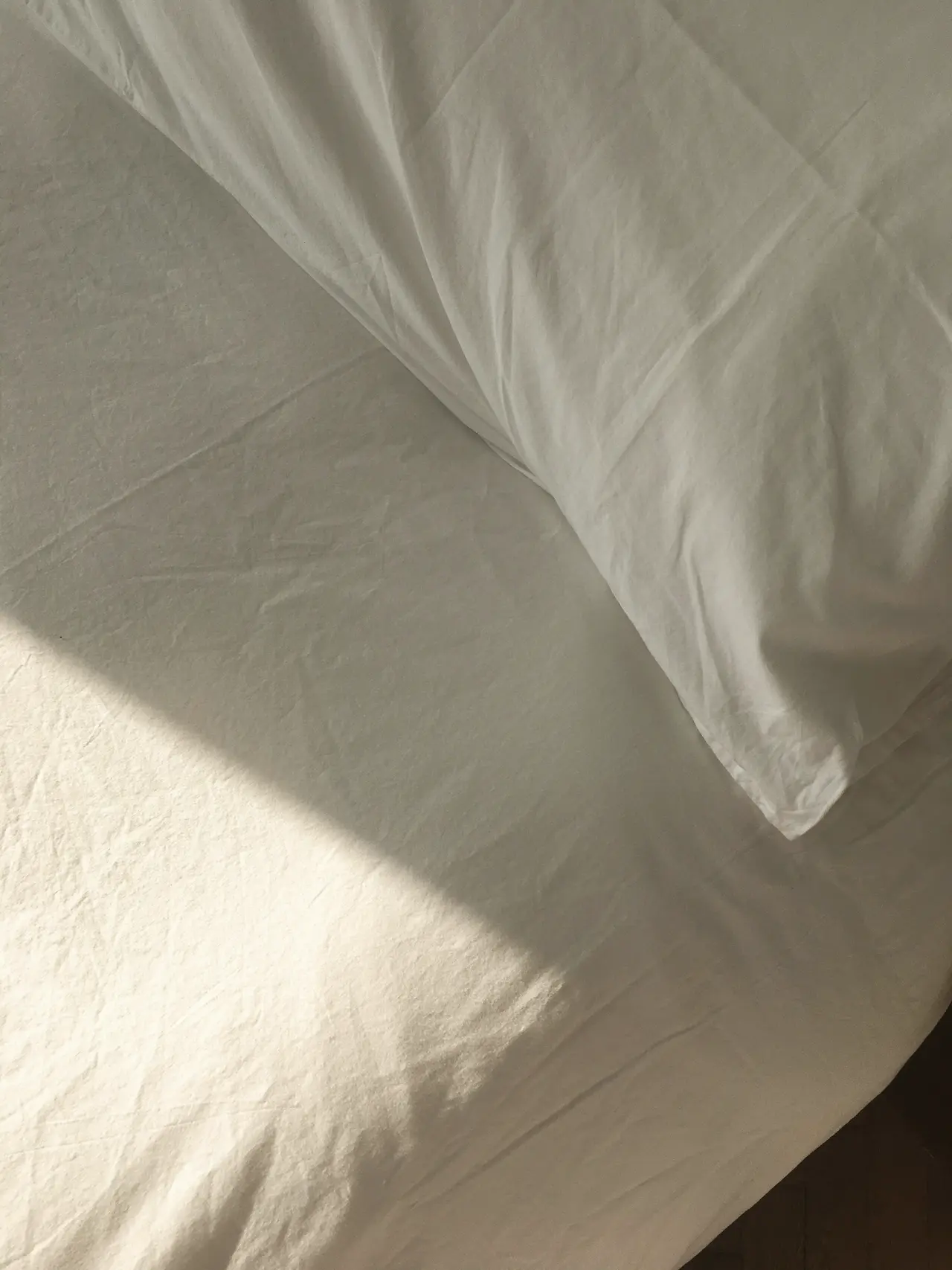 Crisp white sheet in afternoon light
