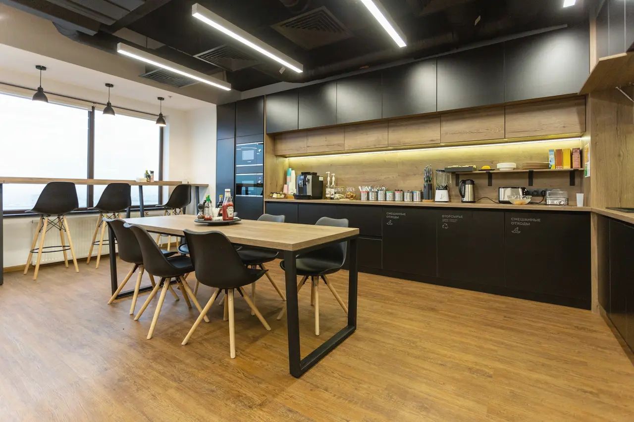 A clean office kitchen and shared table